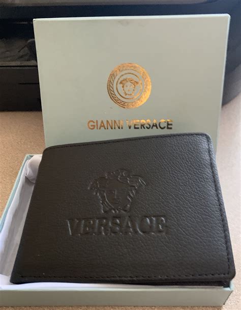 versace collection black wristlet|gianni Versace wallet.